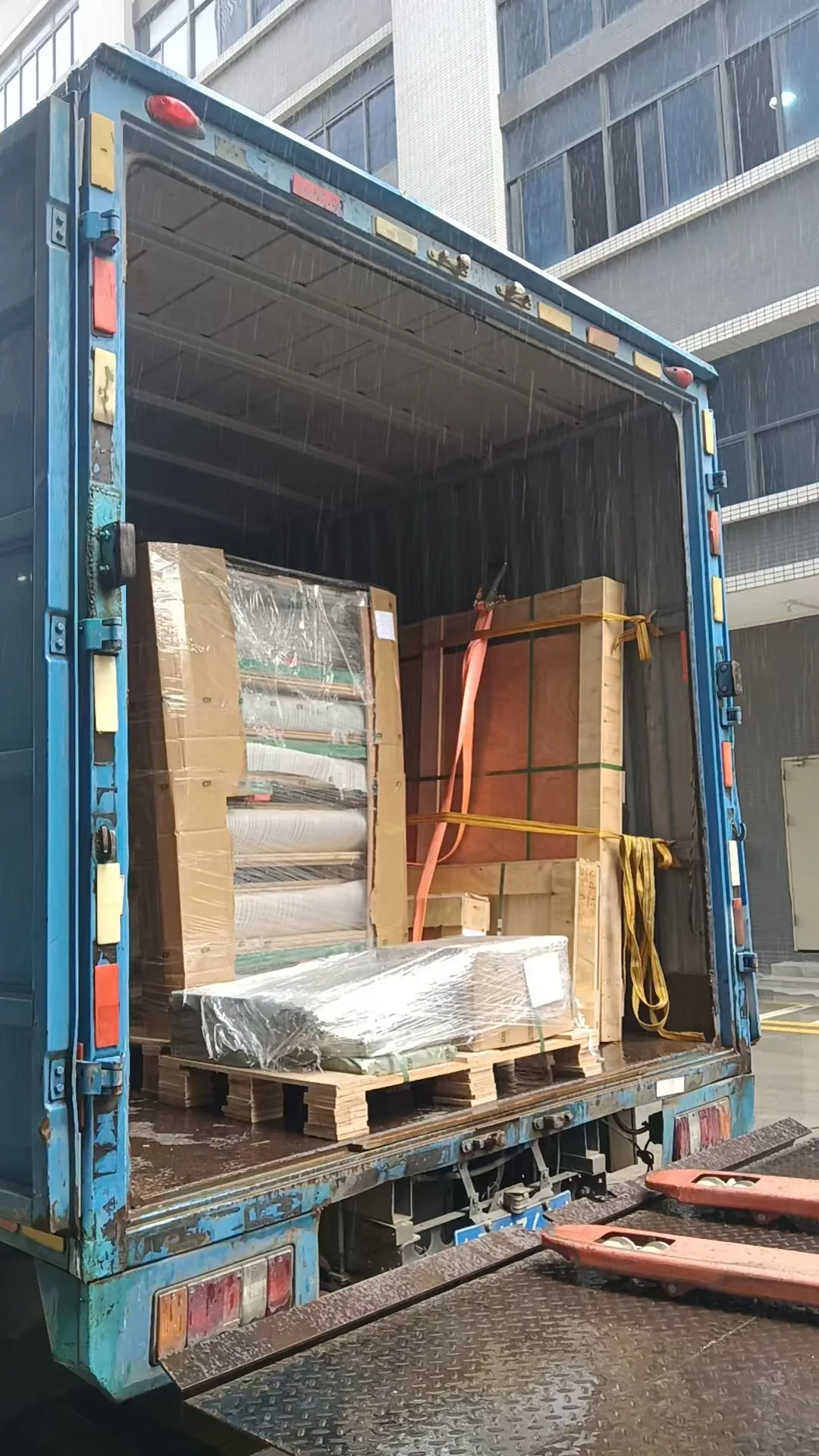 Squash court components prepared for shipping